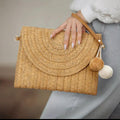 Boho Straw Woven Clutch & Crossbody Bag with Pom-Pom Charm